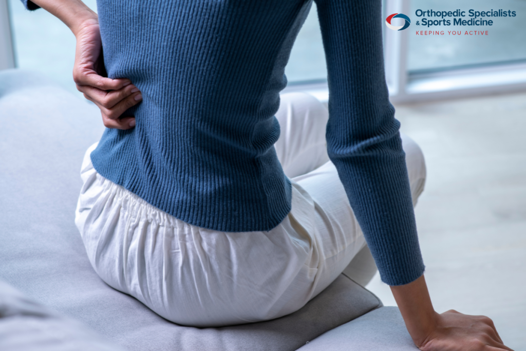A woman with back pain caused by spinal arthritis in Ohio.