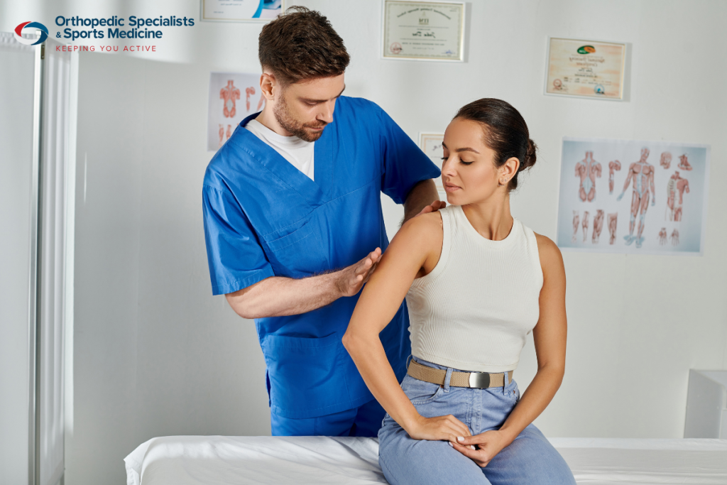A woman at the doctor for a checkup after recovering from Rotator Cuff Surgery in Ohio.